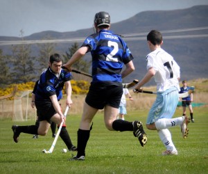 Lewis captain on the ball against Skye